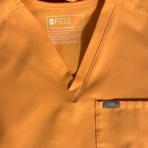 Figs women’s  Orange Short Sleeve tee by Figs